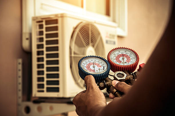 Professional Heat Pump Repair technician working in Louisburg, KS